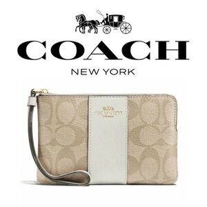 Coach Signature Beige and Cream Wristlet